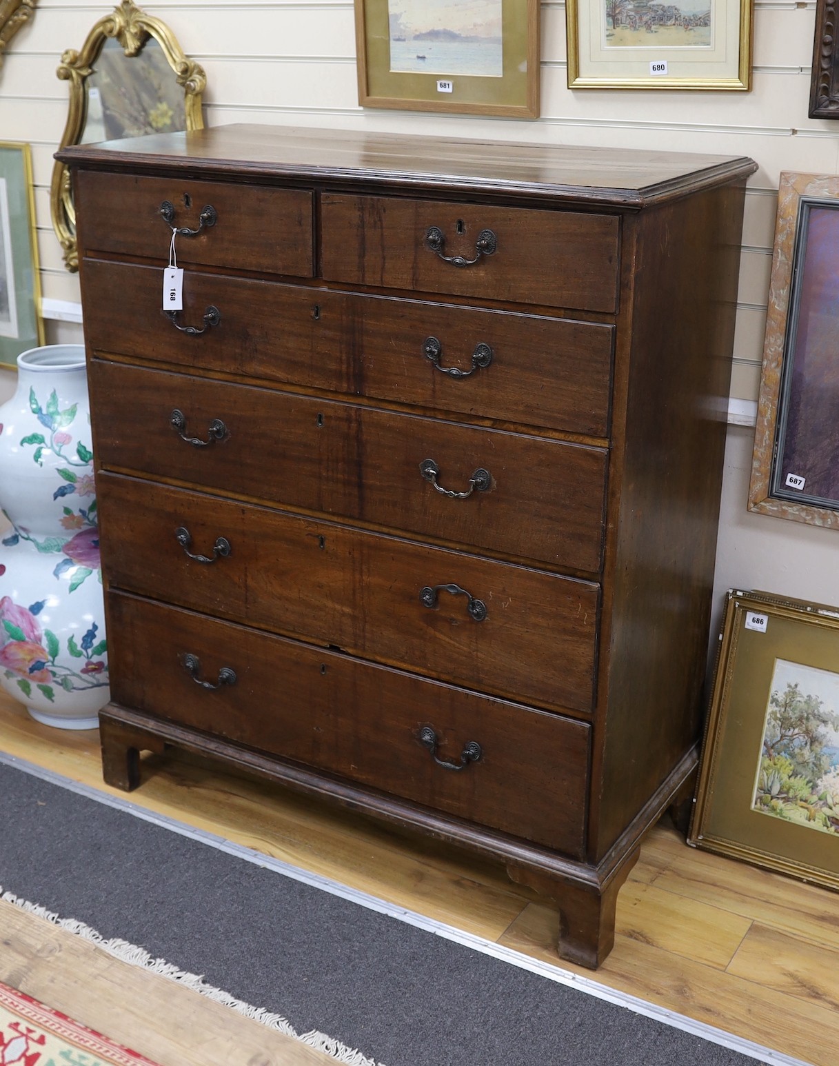 A tall George III mahogany chest, width 110cm, depth 52cm, height 130cm